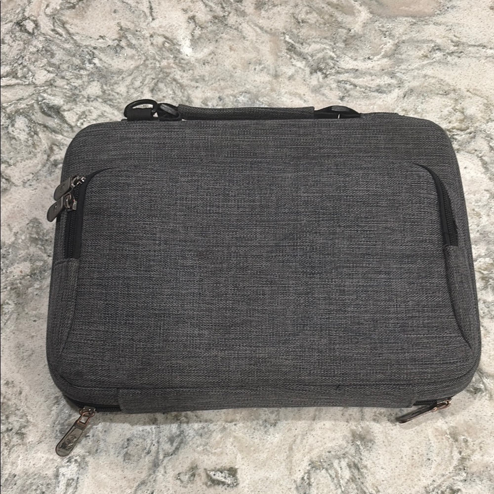 Sleek Gray Laptop Bag with Textured Fabric and Structured Design